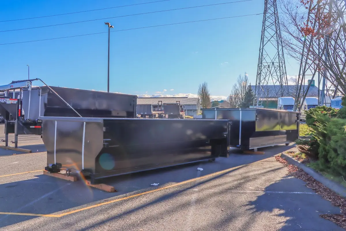 Roll-off dumpster ready for waste disposal at job site for 12 Yard Dumpster Rental in Riverdale